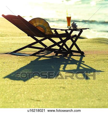 Stock Image - Straw hat, Waves, Ocean, Beach, Seas, Sky, Beaches. Fotosearch