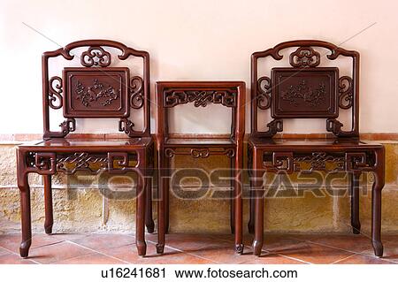 Wooden chairs and coffee table View Large Photo Image Stock Image - Wooden chairs and coffee table. Fotosearch