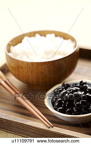 Stock Image - Rice along with black beans. Fotosearch