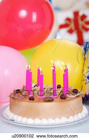 Birthday cake and balloons View Large Photo Image Stock Image - Birthday cake and balloons. Fotosearch