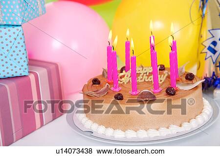 Birthday cake, balloons and wrapped gift View Large Photo Image Stock Photo - Birthday cake, balloons and wrapped gift. Fotosearch