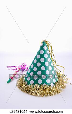 Party hat and party horn blower View Large Photo Image Picture - Party hat and party horn blower. Fotosearch