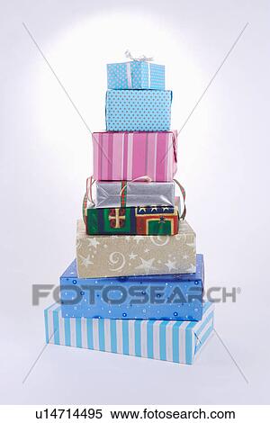 Stacked gift wrapped presents View Large Photo Image Stock Photography - Stacked gift wrapped presents . Fotosearch