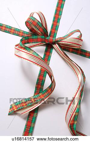 Wrapped gift with ribbon View Large Photo Image Stock Photo - Wrapped gift with ribbon. Fotosearch
