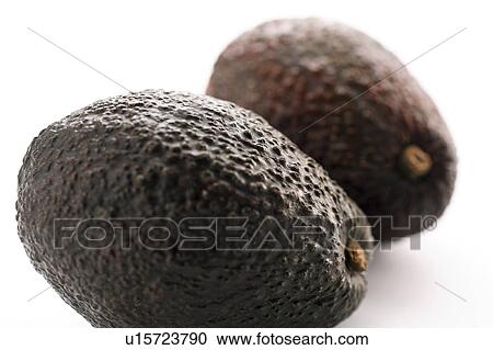 Stock Image - Avocado pears. Fotosearch