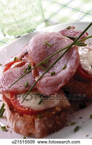 Bacon, mozzarella and tomato on toast View Large Photo Image Stock Photo - Bacon, mozzarella and tomato on toast. Fotosearch