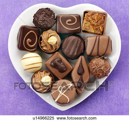 Stock Photography - Belgian Chocolate in Heart Shaped Dish - Non Exclusive. Fotosearch
