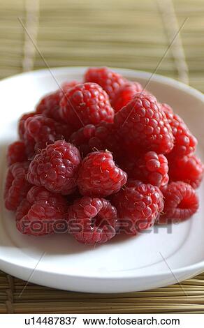 Stock Photo - Bowl of fresh raspberries. Fotosearch