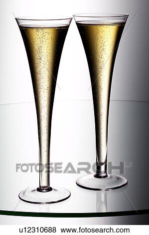 Champagne flutes View Large Photo Image Stock Photo - Champagne flutes. Fotosearch