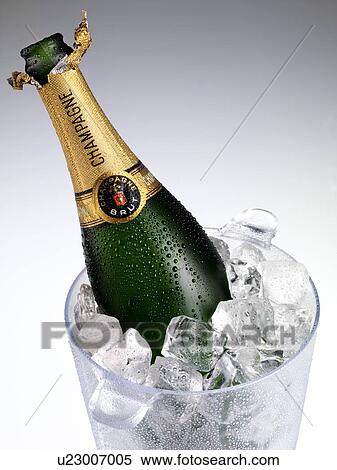 Stock Photography - Champagne in Ice Bucket - Non Exclusive. Fotosearch