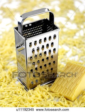 Stock Photography - Cheese and grater. Fotosearch