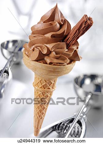 Stock Photo - Chocolate Ice Cream in Cone With Chocolate Flake - Non Exclusive. Fotosearch