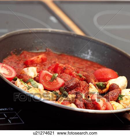 Stock Image - Chorizo and chicken. Fotosearch