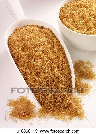 Stock Photo - Demarera Sugar in Scoop - Non Exclusive. Fotosearch