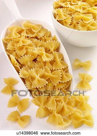 Stock Photograph - Farfalle Pasta in Scoop - Non Exclusive. Fotosearch