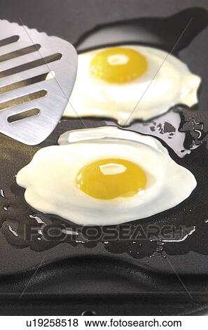 Fried eggs View Large Photo Image Stock Photo - Fried eggs. Fotosearch