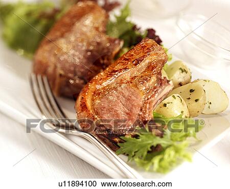Stock Image - Grilled Lamb Chops - Non Exclusive. Fotosearch