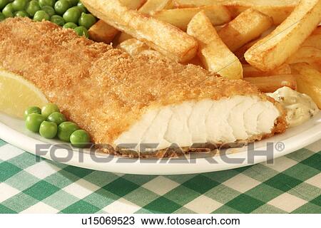 Stock Image - Haddock Chips And Peas - Non Exclusive. Fotosearch