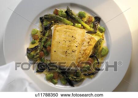 Halibut on bed of asparagus View Large Photo Image Stock Image - Halibut on bed of asparagus. Fotosearch