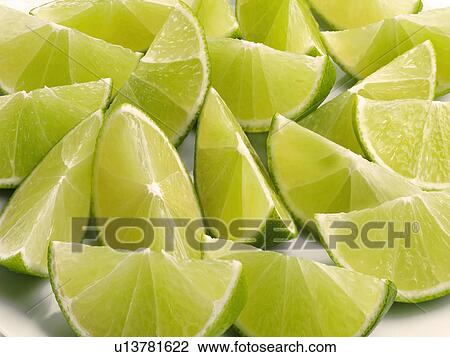 Lime Segments - Non Exclusive View Large Photo Image Stock Image - Lime Segments - Non Exclusive. Fotosearch