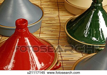 Moroccan tagine pots on a market stall View Large Photo Image Stock Photography - Moroccan tagine pots on a market stall. Fotosearch