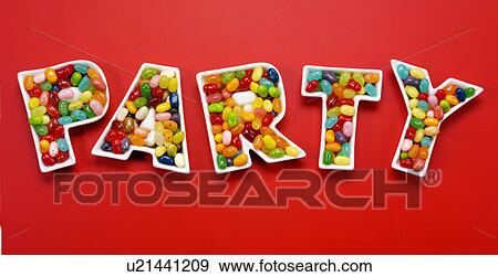 Stock Photo - Party Jelly Beans on Red - Non Exclusive. Fotosearch