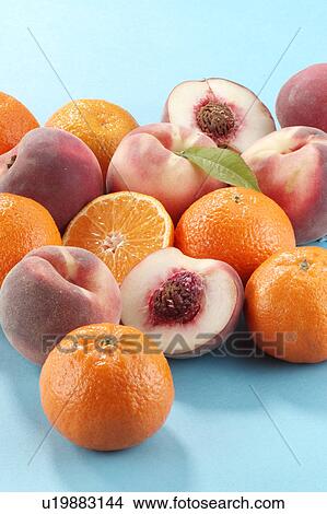 Picture - peaches and mandarines. Fotosearch
