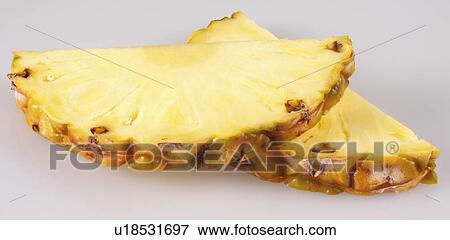 Stock Photo - Pineapple Slices - Non Exclusive. Fotosearch