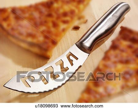 Pizza Knife - Non Exclusive View Large Photo Image Stock Image - Pizza Knife - Non Exclusive. Fotosearch
