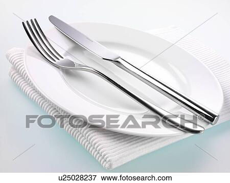 Stock Photo - Plate With Knife And Fork. Fotosearch