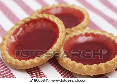 Stock Image - Raspberry tarts. Fotosearch