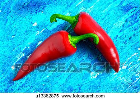 red chillies on blue View Large Photo Image Stock Photography - red chillies on blue. Fotosearch