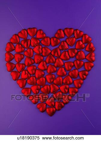 Red Chocolate Heart on Purple - Non Exclusive View Large Photo Image Stock Photography - Red Chocolate Heart on Purple - Non Exclusive. Fotosearch