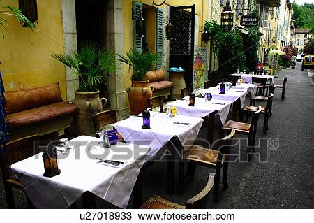 Stock Image - Restaurant table setting. Fotosearch