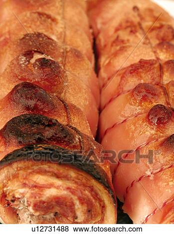 Stock Photo - Rolled pork joints. Fotosearch