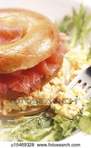 Salmon and scrambled egg bagel View Large Photo Image Stock Photo - Salmon and scrambled egg bagel. Fotosearch