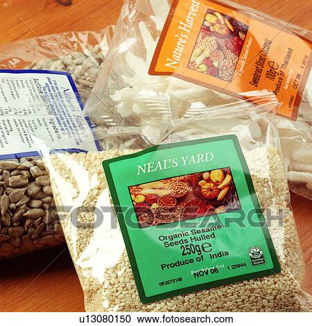 Sesame seed and sunflower seeds packaging View Large Photo Image Stock Image - Sesame seed and sunflower seeds packaging. Fotosearch