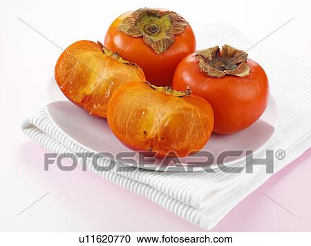 Stock Image - Sharon Fruit / Persimmon Fruit. Fotosearch