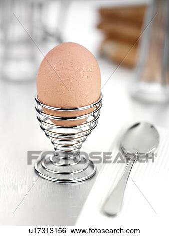 Stock Photograph - Single boiled egg. Fotosearch