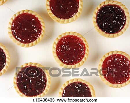 Stock Image - Six Jam Tarts. Fotosearch