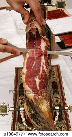 Stock Photo - Smoked ham on the bone. Fotosearch