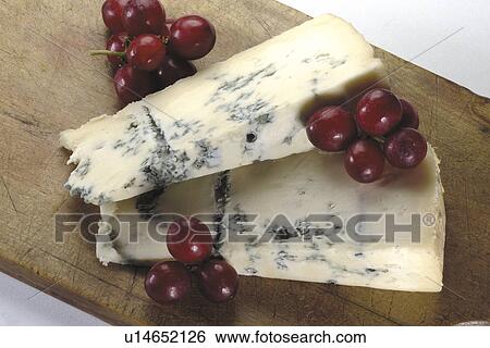 Stilton with red grapes View Large Photo Image Stock Photograph - Stilton with red grapes. Fotosearch