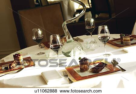 Table setting for four View Large Photo Image Stock Photo - Table setting for four. Fotosearch