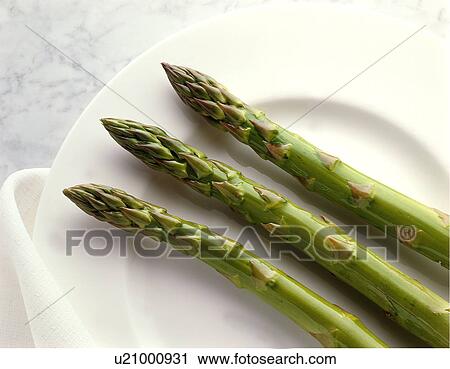 Three spears of asparagus View Large Photo Image Stock Image - Three spears of asparagus. Fotosearch