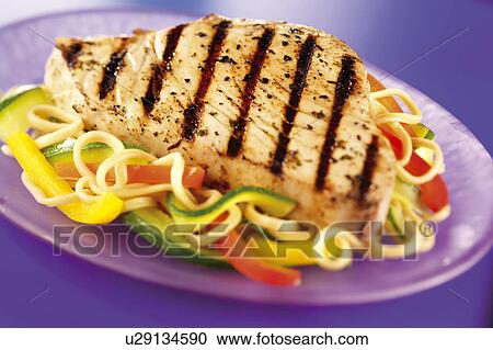 Stock Image - Tuna Steak With Sauce - Non Exclusive. Fotosearch