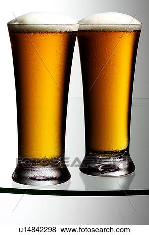 Two lager beers View Large Photo Image Stock Photo - Two lager beers. Fotosearch