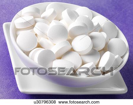 Stock Photo - Vitamin Tablets - Non Exclusive. Fotosearch