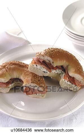 Bagel with ham and cream cheese View Large Photo Image Stock Photograph - Bagel with ham and cream cheese. Fotosearch