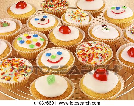 Stock Image - Baking Cupcakes - Non Exclusive. Fotosearch