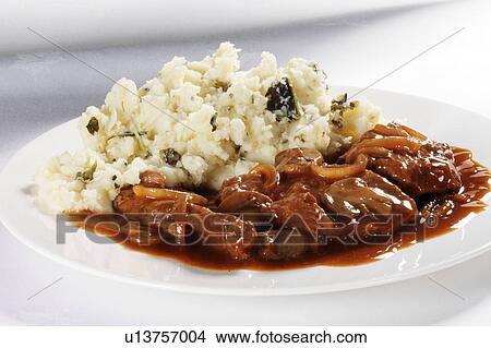 beef, gravy with mashed potato and mushroom View Large Photo Image Picture - beef, gravy with mashed potato and mushroom. Fotosearch